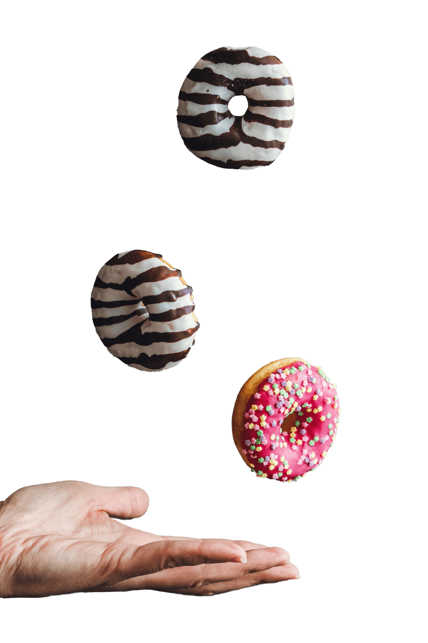 Donuts fliegen auf Hand